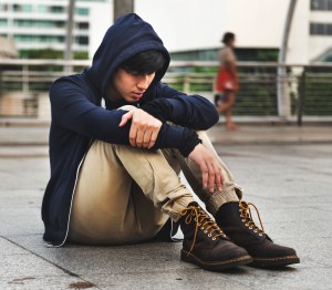 Asian Guy Sit on the Street Depression